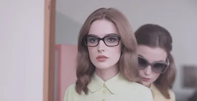 Two Women With Vintage Hairstyles And Fashionable Eyewear
