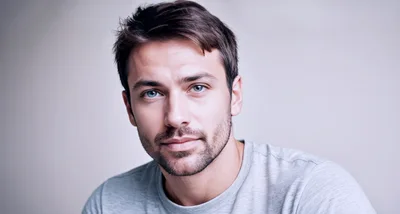 Portrait Of A Handsome Man With Blue Eyes