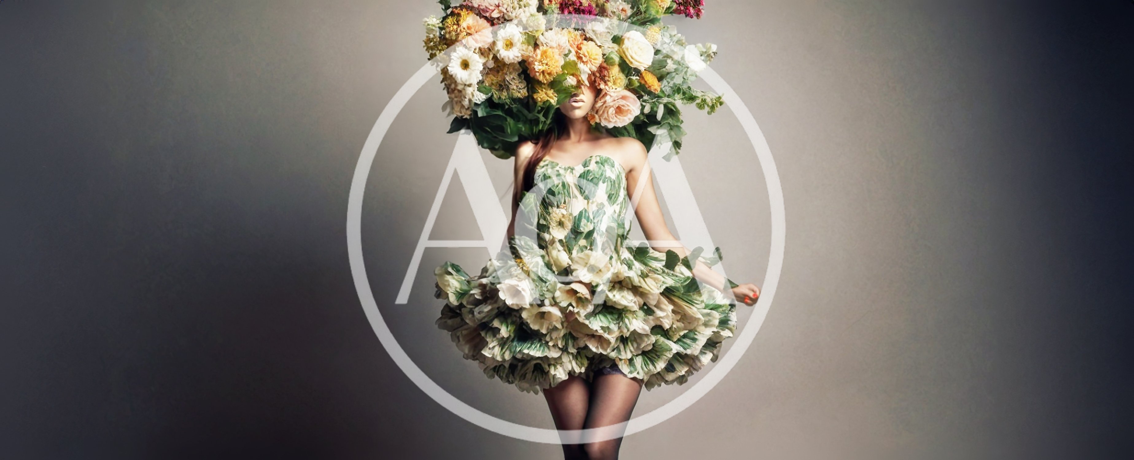 Fashion Model Wearing Elaborate Floral Dress And Headpiece