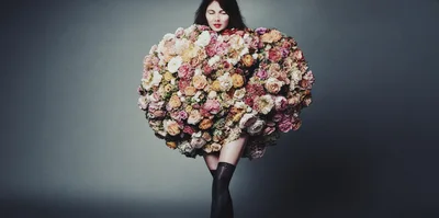 Woman Wearing A Large Floral Dress