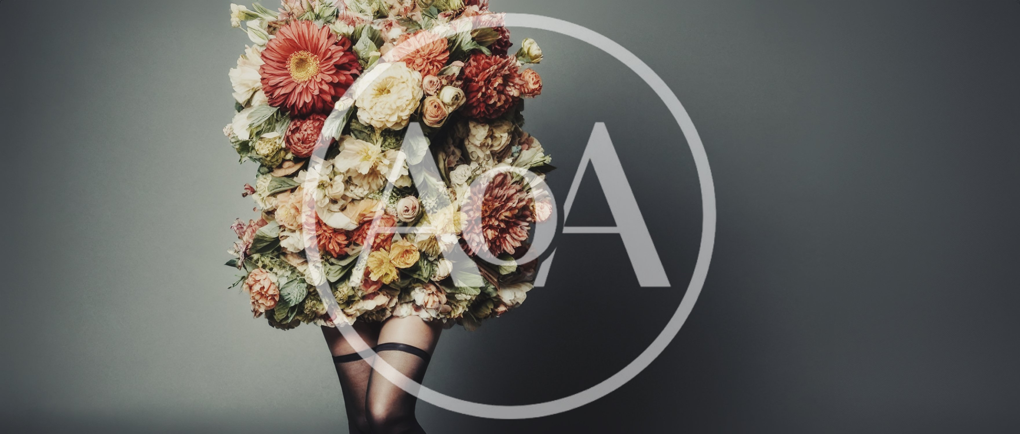 Woman Wearing A Floral Dress Made Of Flowers