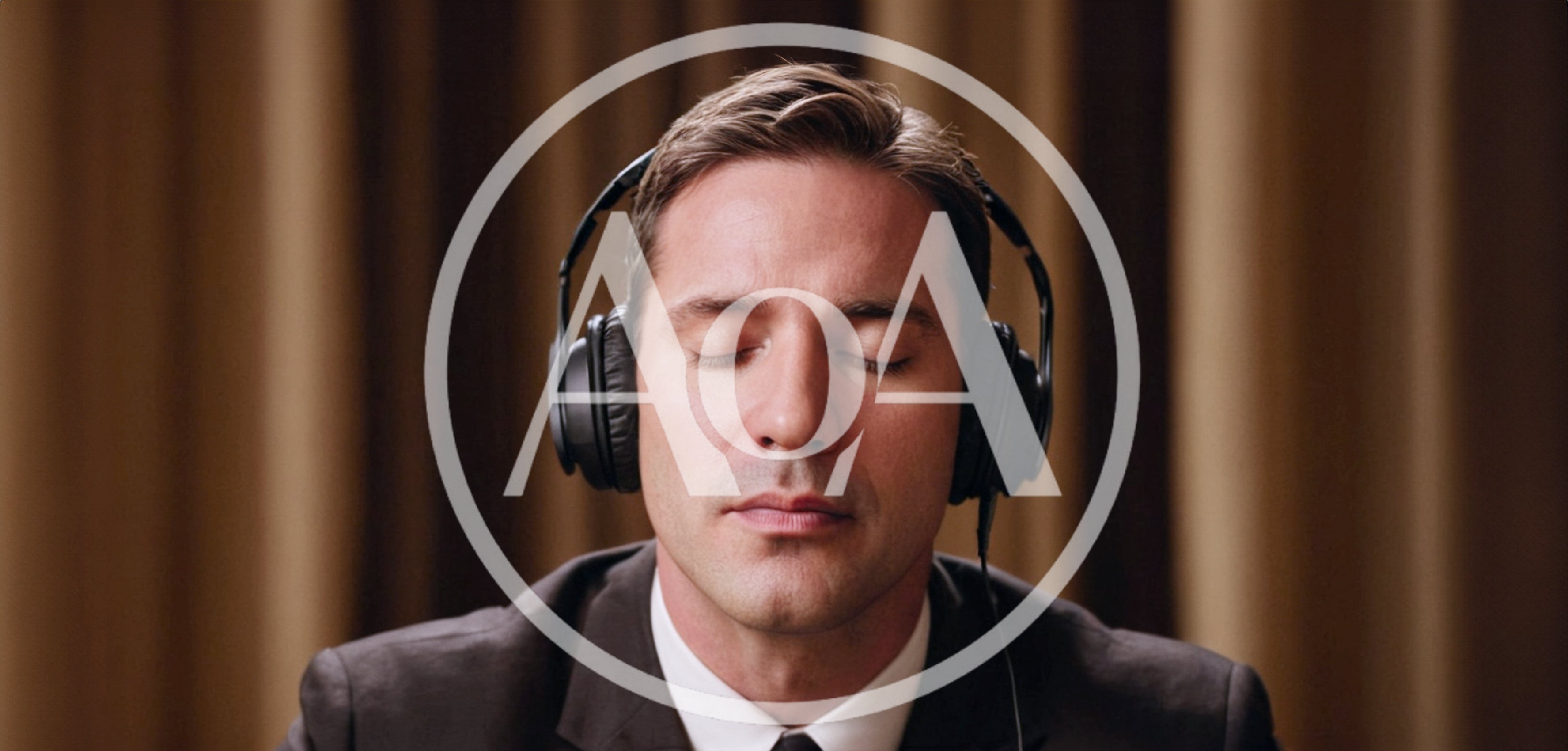 Businessman Listening To Music With Closed Eyes