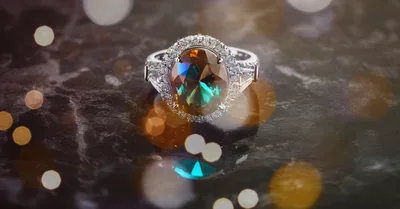 Elegant Oval Cut Alexandrite Ring on Marble Surface