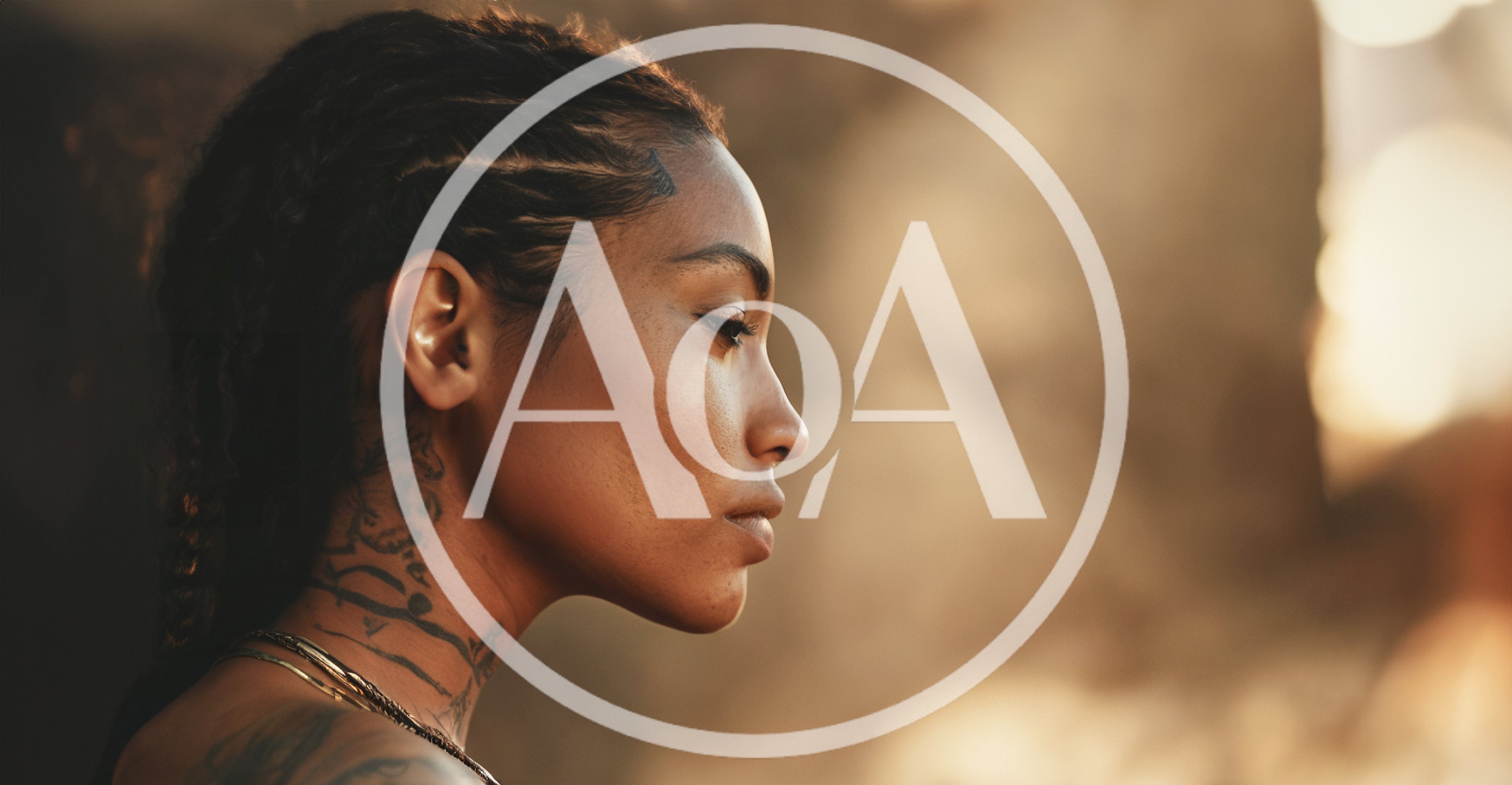 Profile Portrait Of A Young Woman With Neck Tattoos