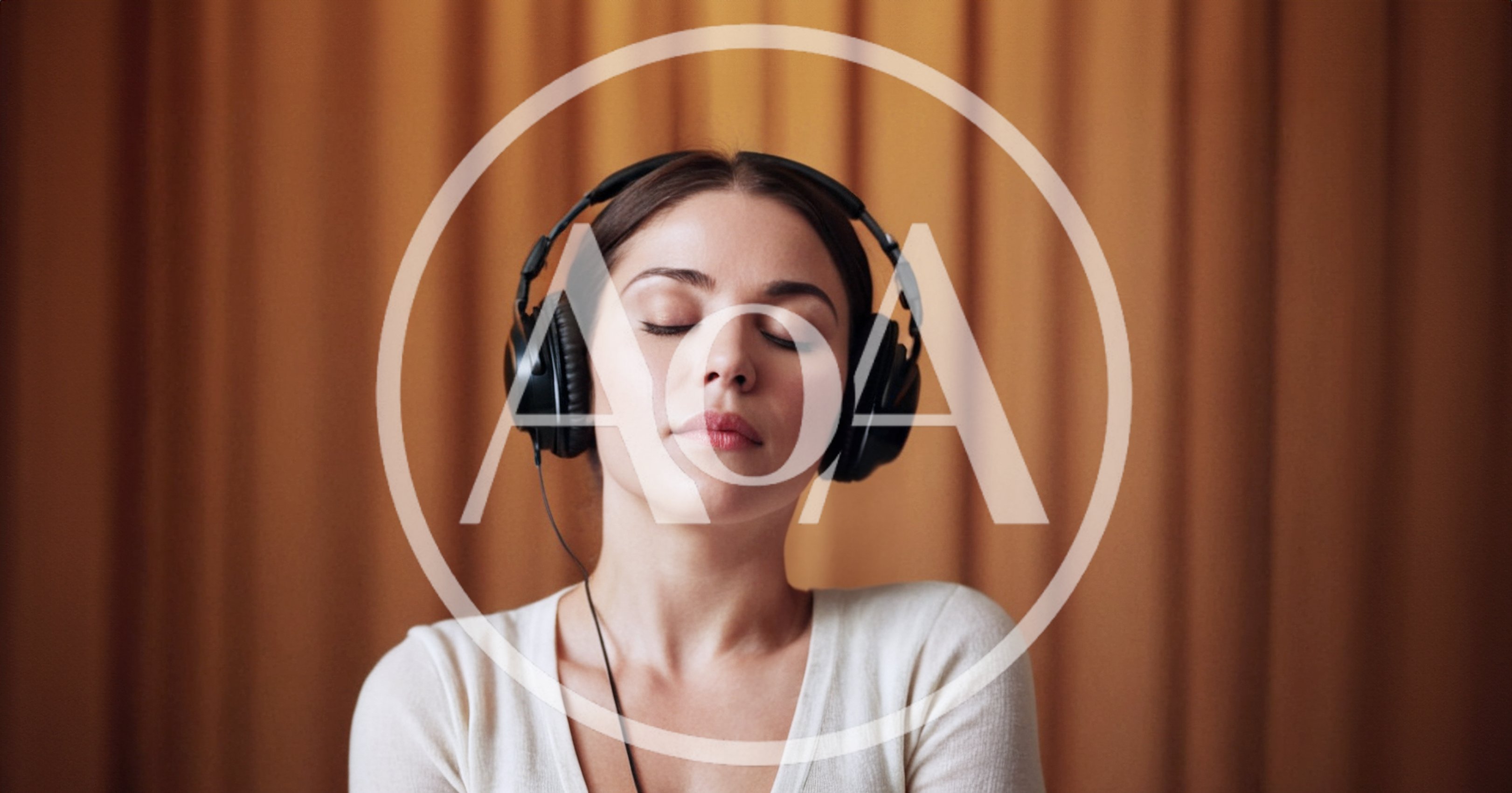 Young Woman Listening To Music With Headphones