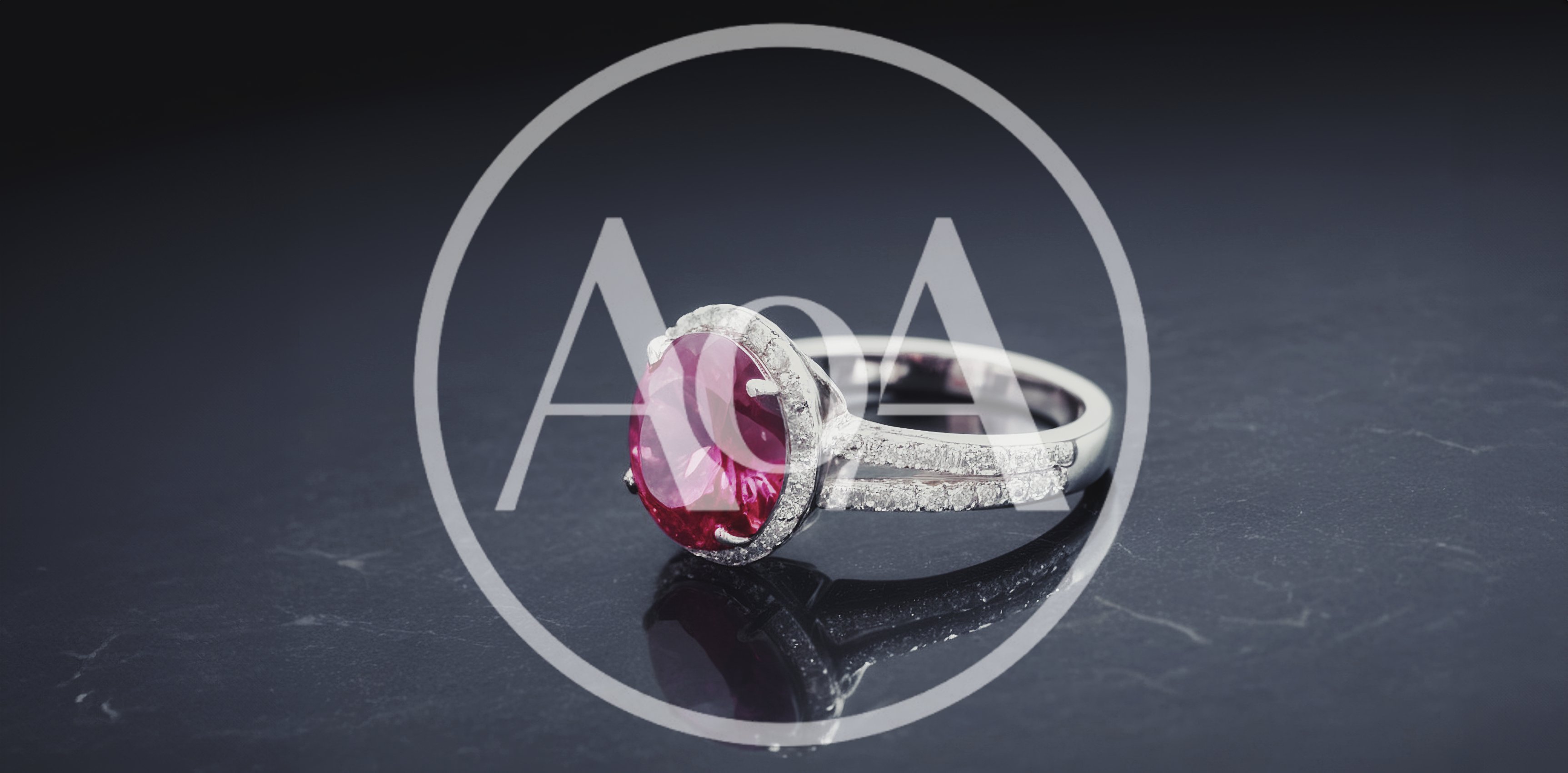 Elegant Ruby Ring With Diamond Halo On Dark Surface