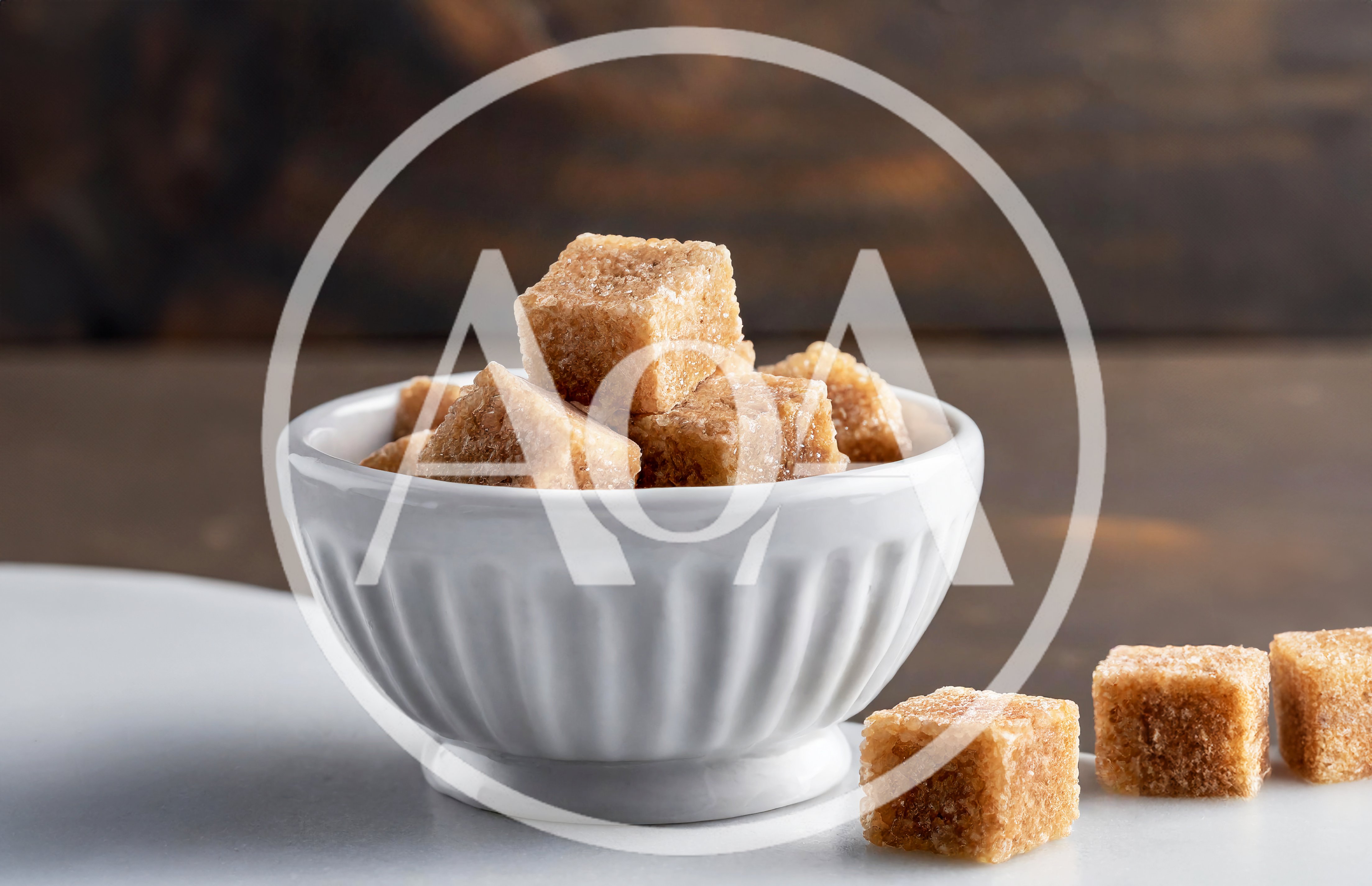 Brown Sugar Cubes in a White Bowl
