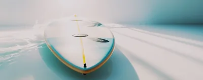 Surfboard Gliding Over Calm Ocean Water