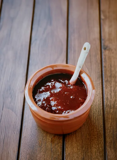Ceramic Pot Filled With Dark Red Fruit Jam