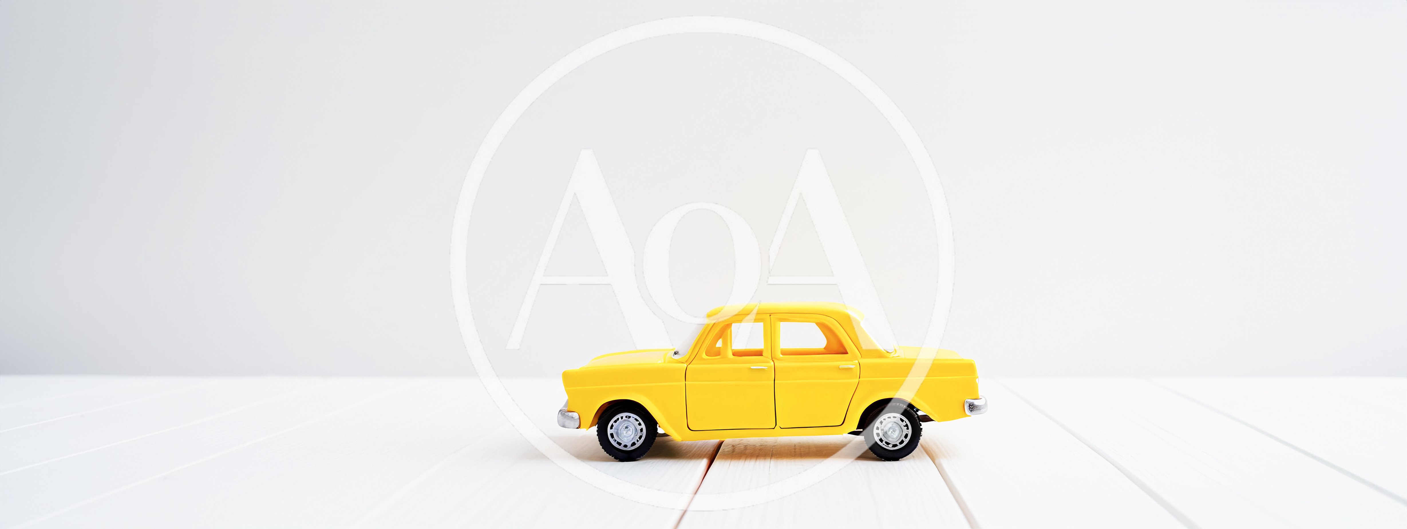 Yellow Toy Car On White Wooden Surface