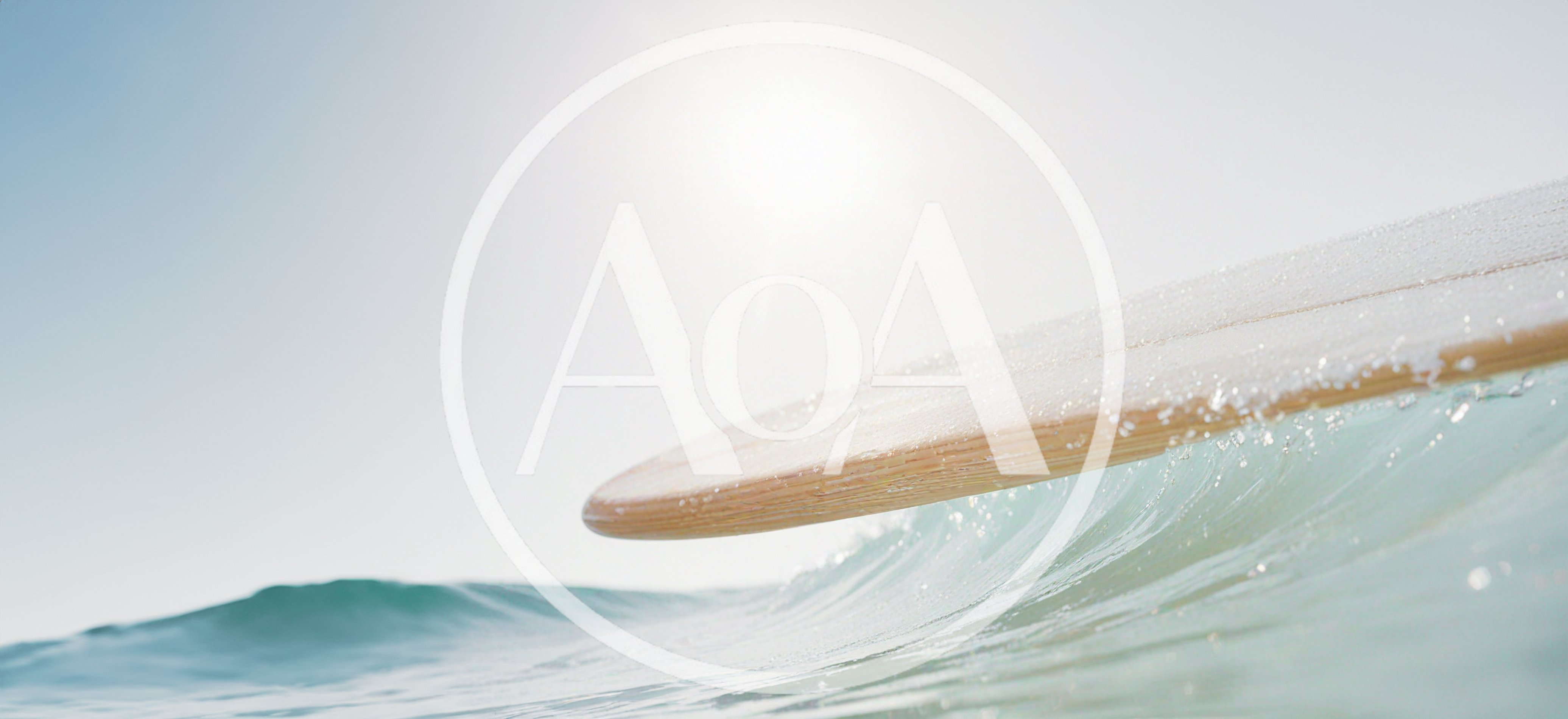 Wooden Surfboard Gliding Over A Breaking Ocean Wave