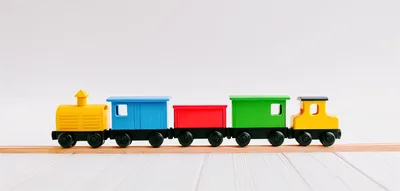 Colorful Wooden Toy Train On Tracks
