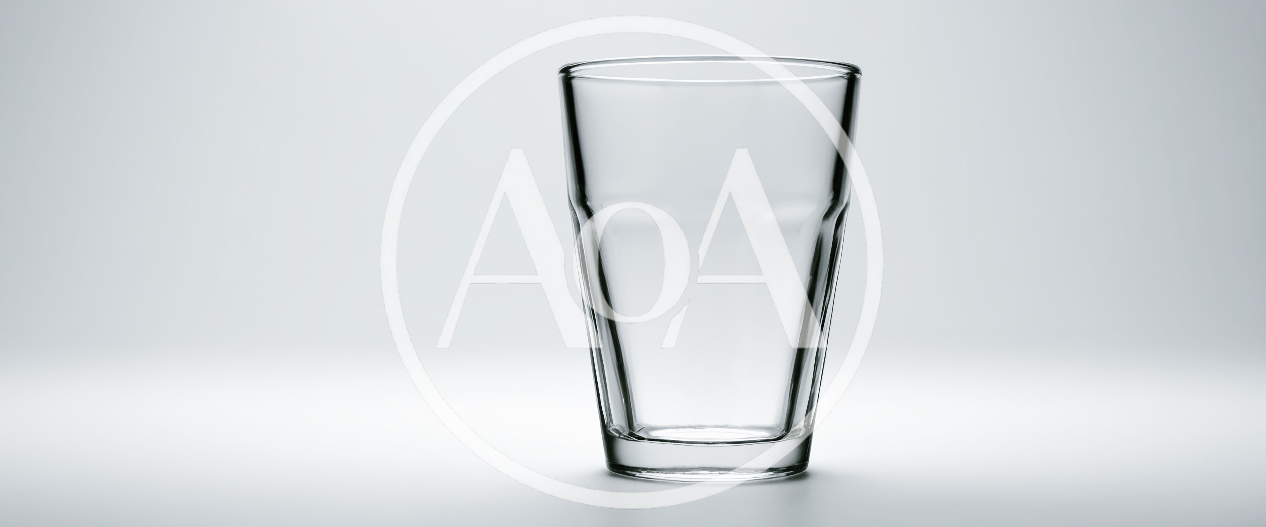 Empty Clear Glass Tumbler On White Background