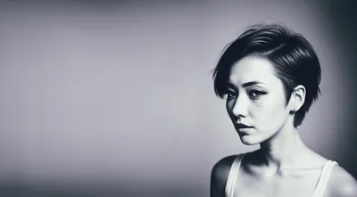 Portrait Of A Young Woman With Short Hair
