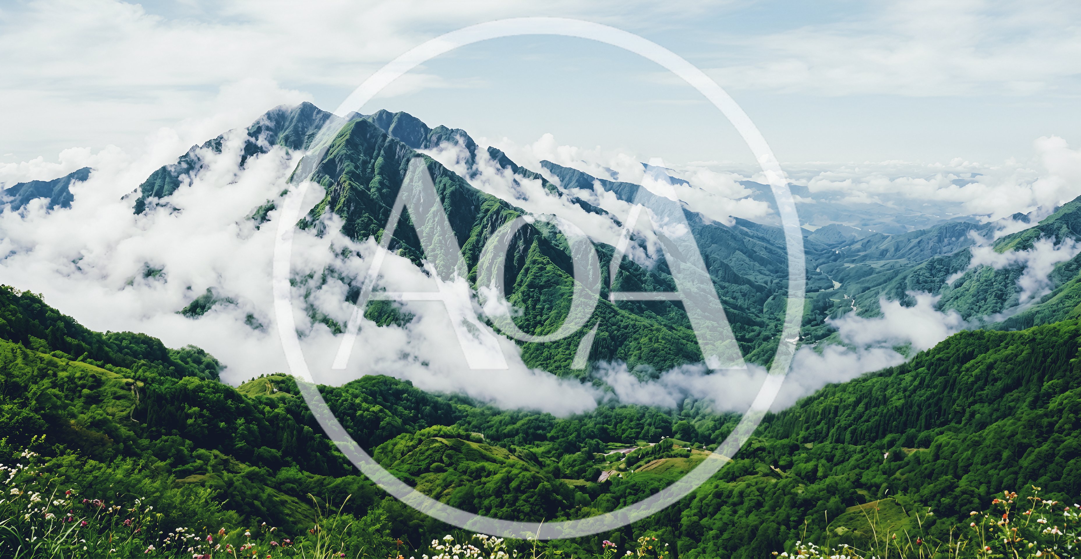 Lush Green Mountain Range With Rolling Clouds