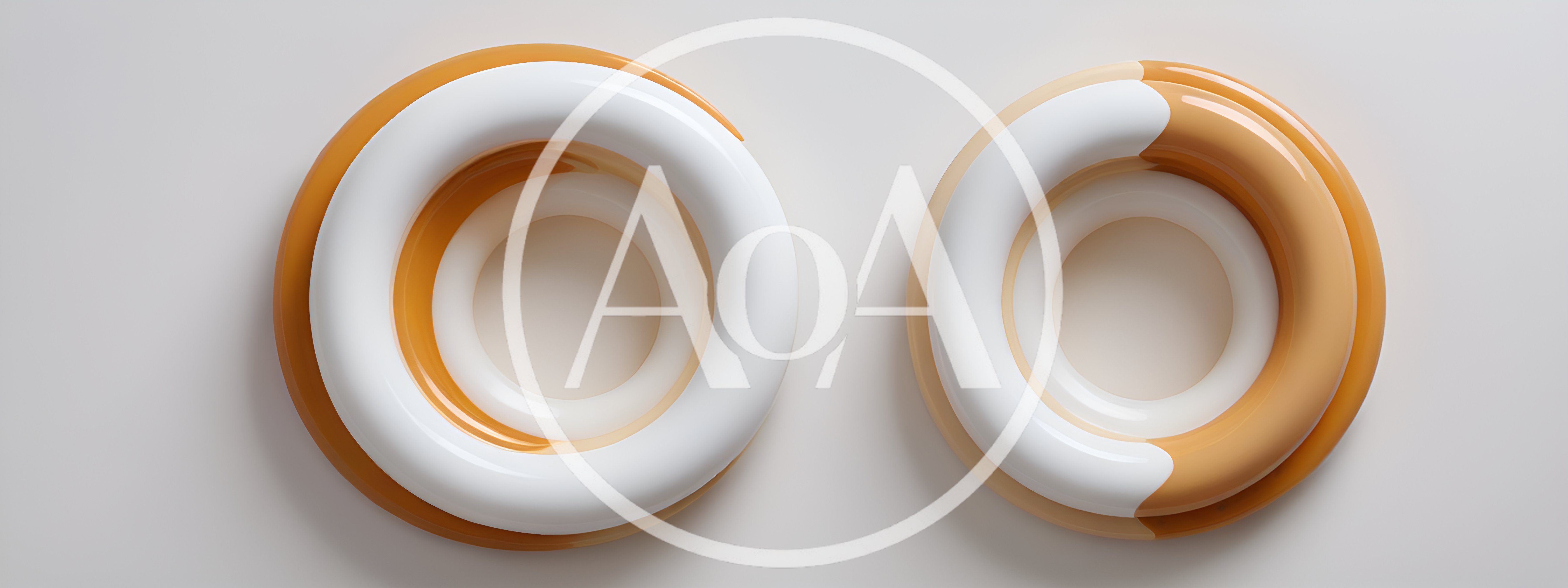 Two Abstract Glossy Torus Shapes On White Background