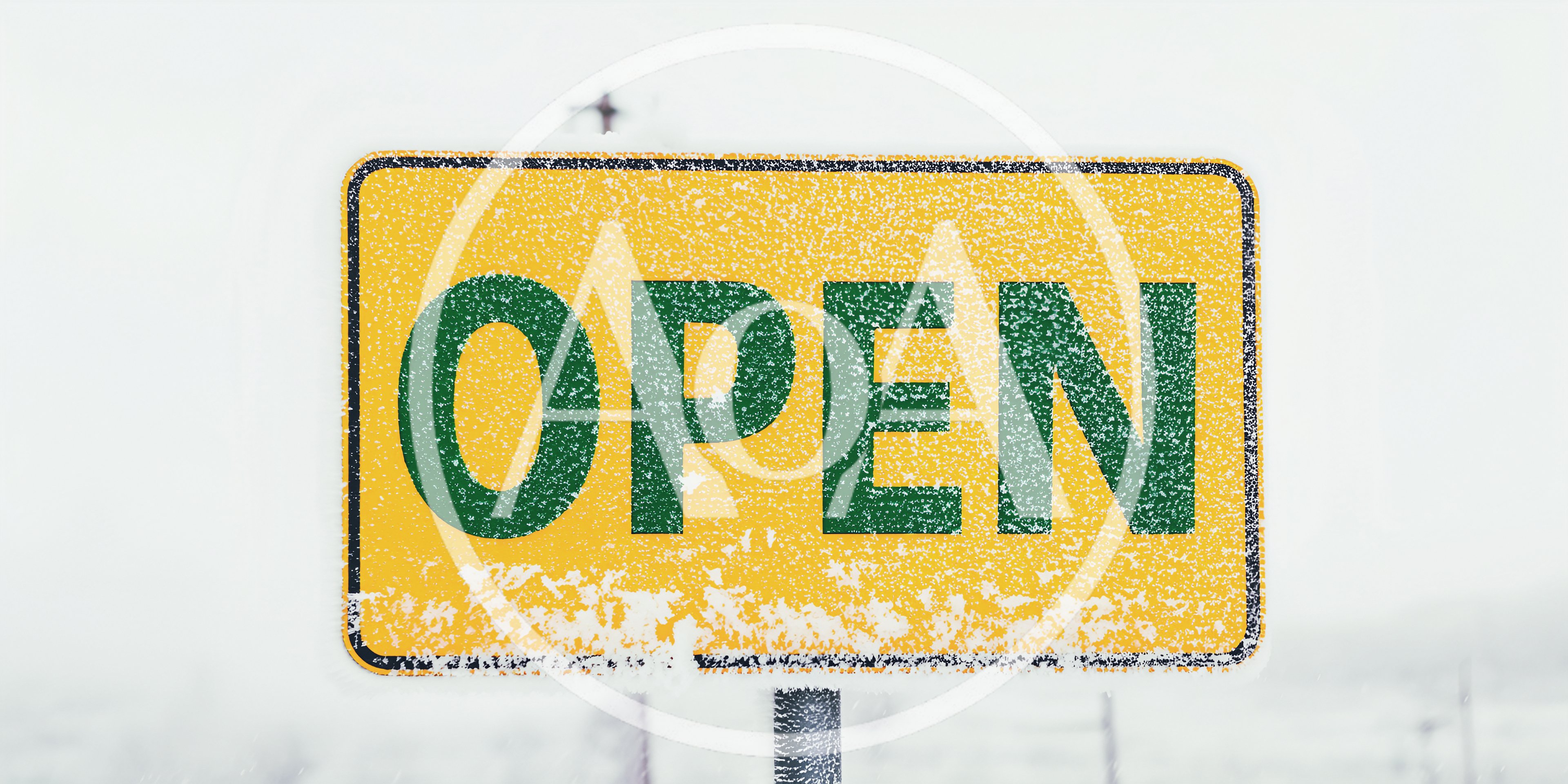 Yellow Open Sign Covered In Winter Snow