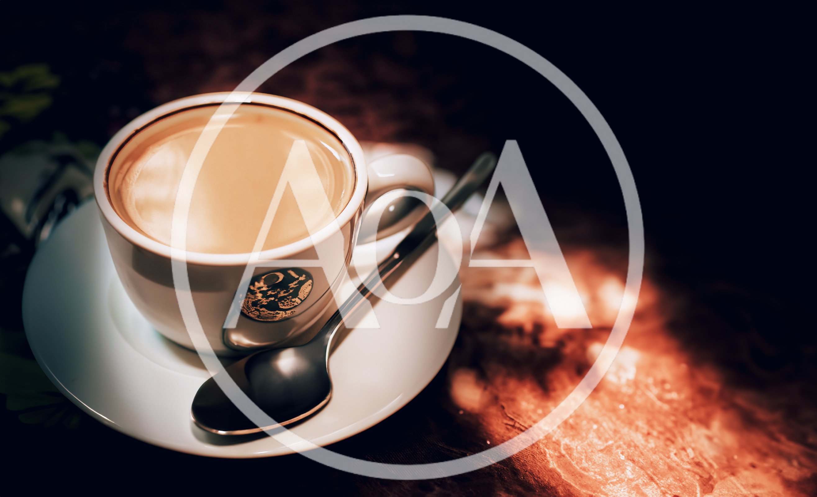 Cup Of Coffee With A Spoon On A Table