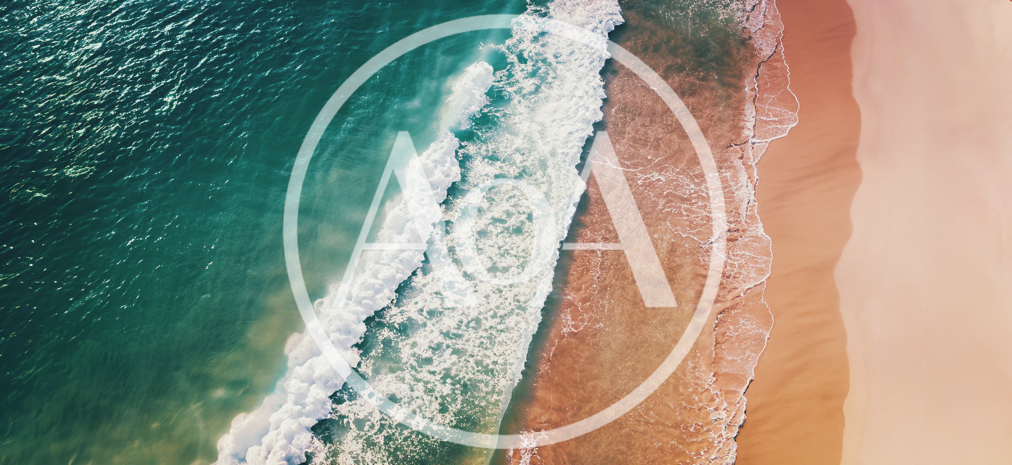Aerial View Of Ocean Waves Crashing On Sandy Beach