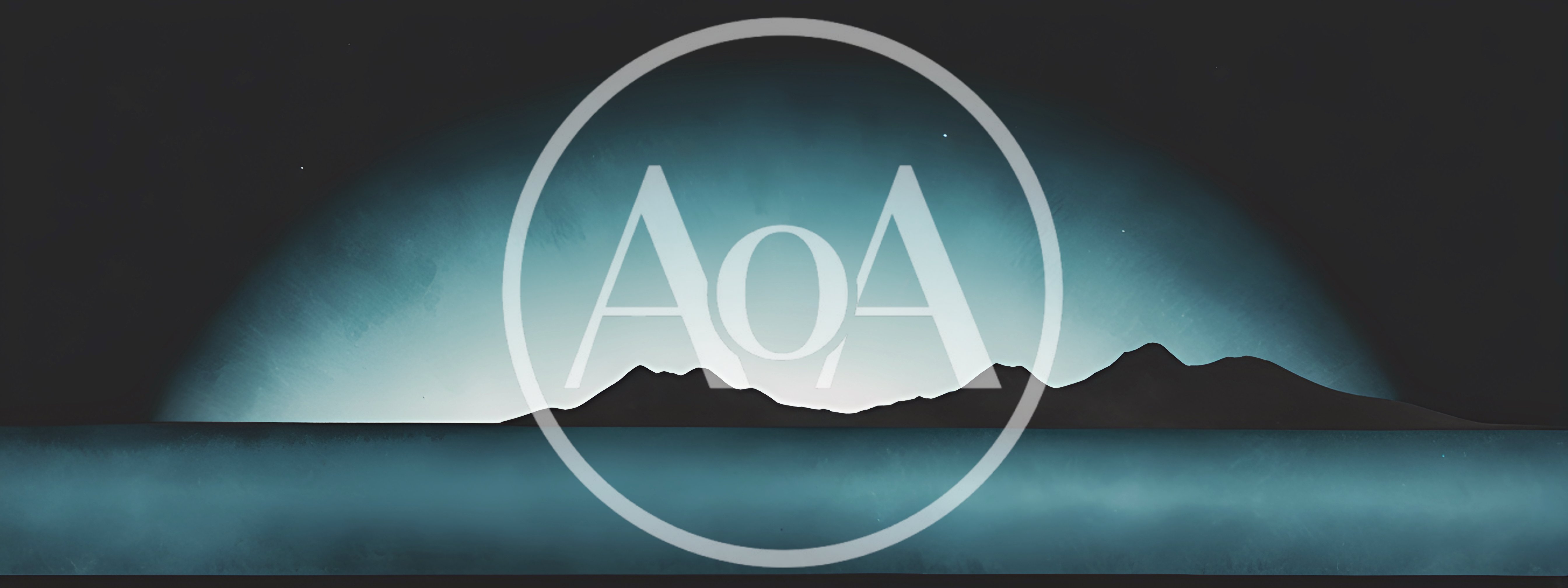 Minimalist Silhouette Of Mountains Over A Calm Sea