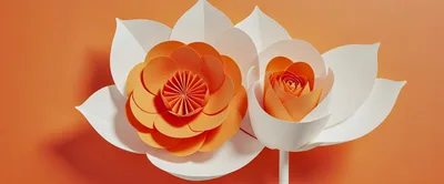 Handmade Paper Flowers On Orange Background