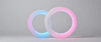 Two Interlocking Glowing Circular LED Light Rings