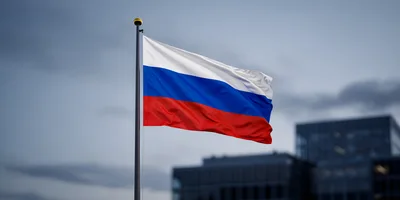 Russian Flag Waving Against A Cloudy Sky