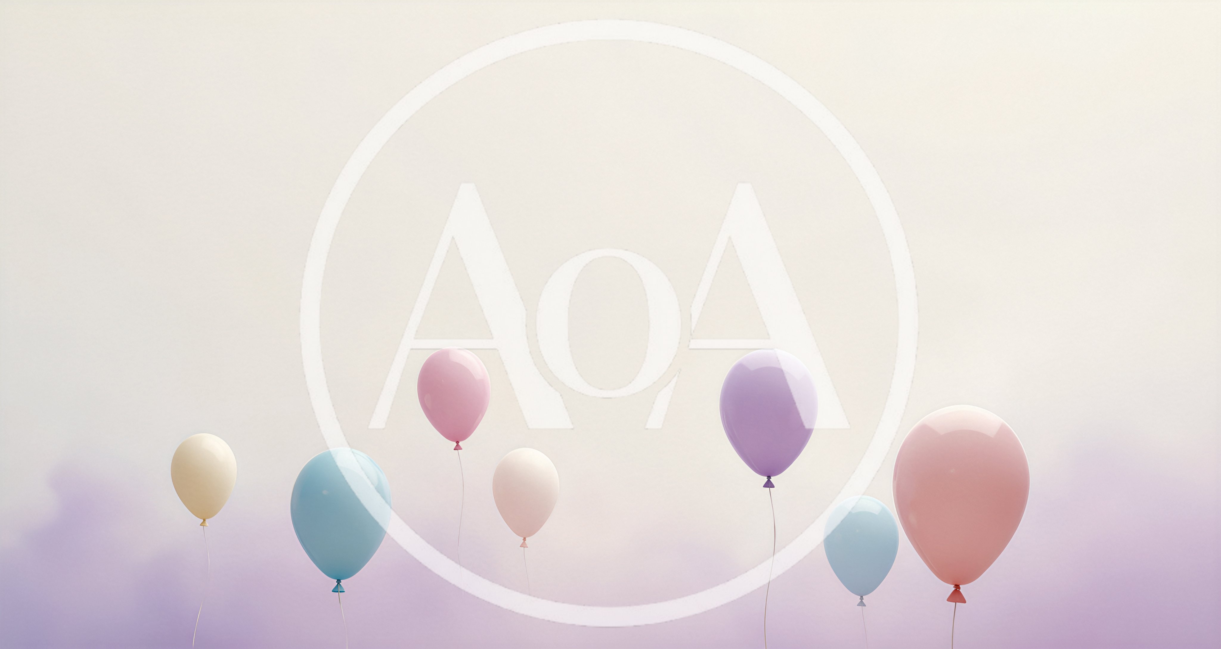 Pastel Colored Balloons Floating Against A Soft Hazy Background