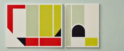 Two Abstract Geometric Art Prints On A Wall