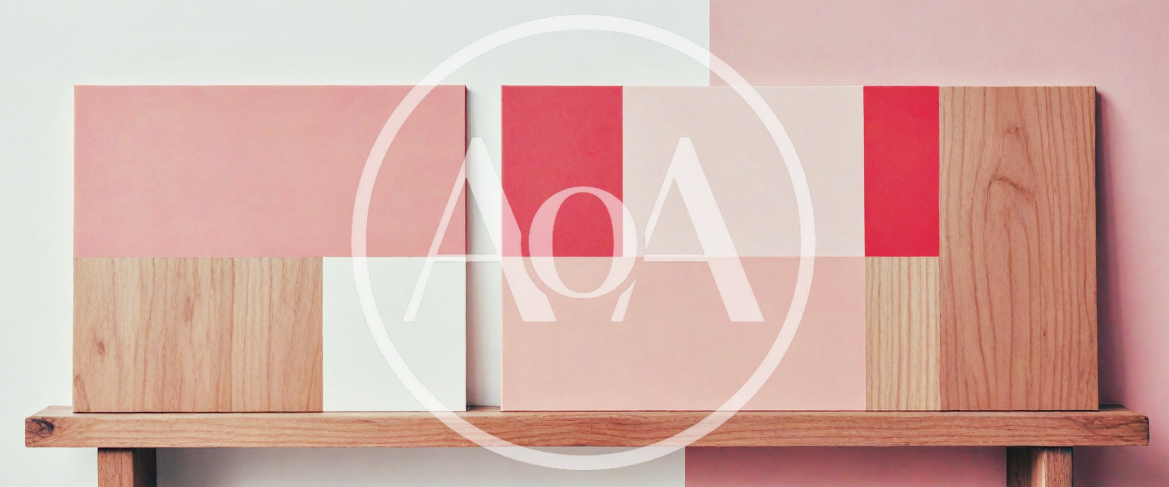 Two Abstract Geometric Art Pieces On A Wooden Shelf