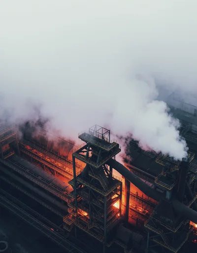 Aerial View Of Industrial Steel Plant With Smoke