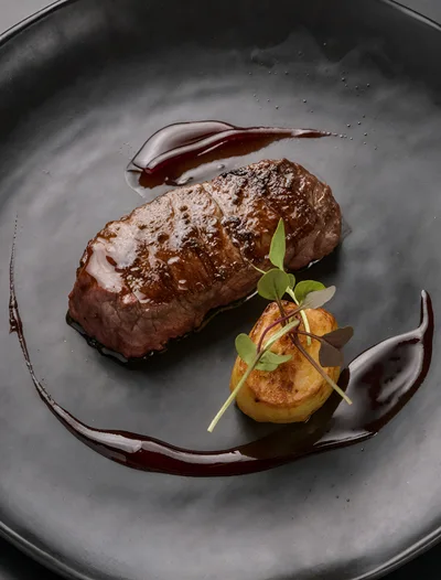 Gourmet Seared Steak With Potato And Red Wine Reduction