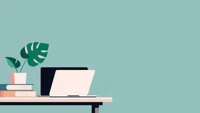 Minimalist Desk Setup With Laptop And Potted Plant