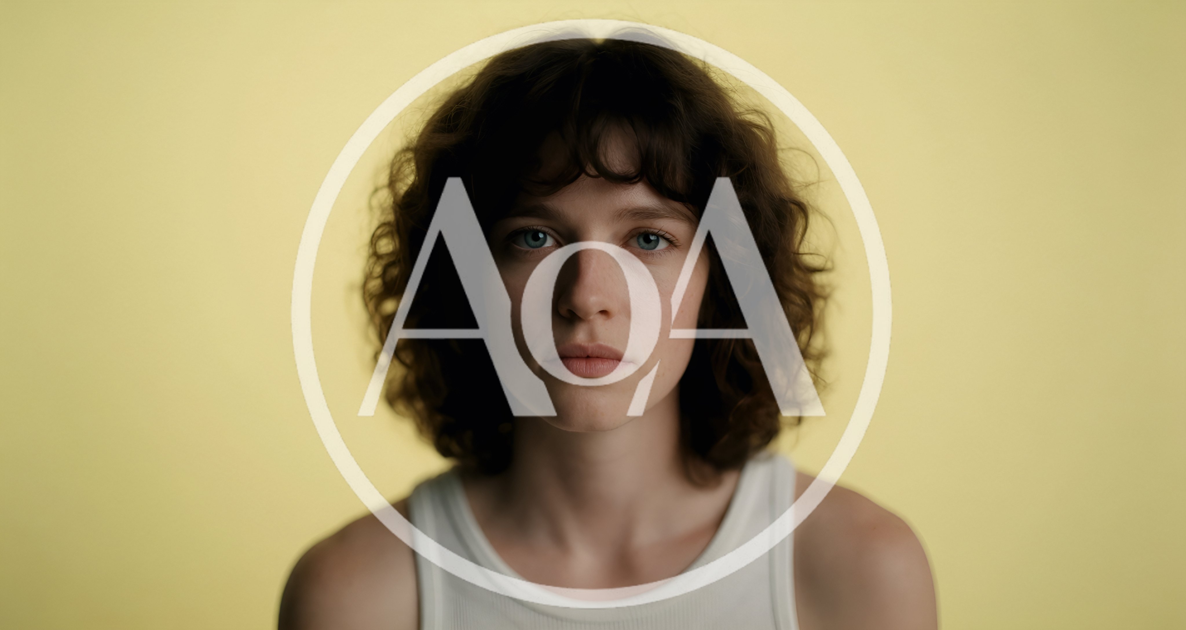 Portrait Of A Young Woman With Curly Hair