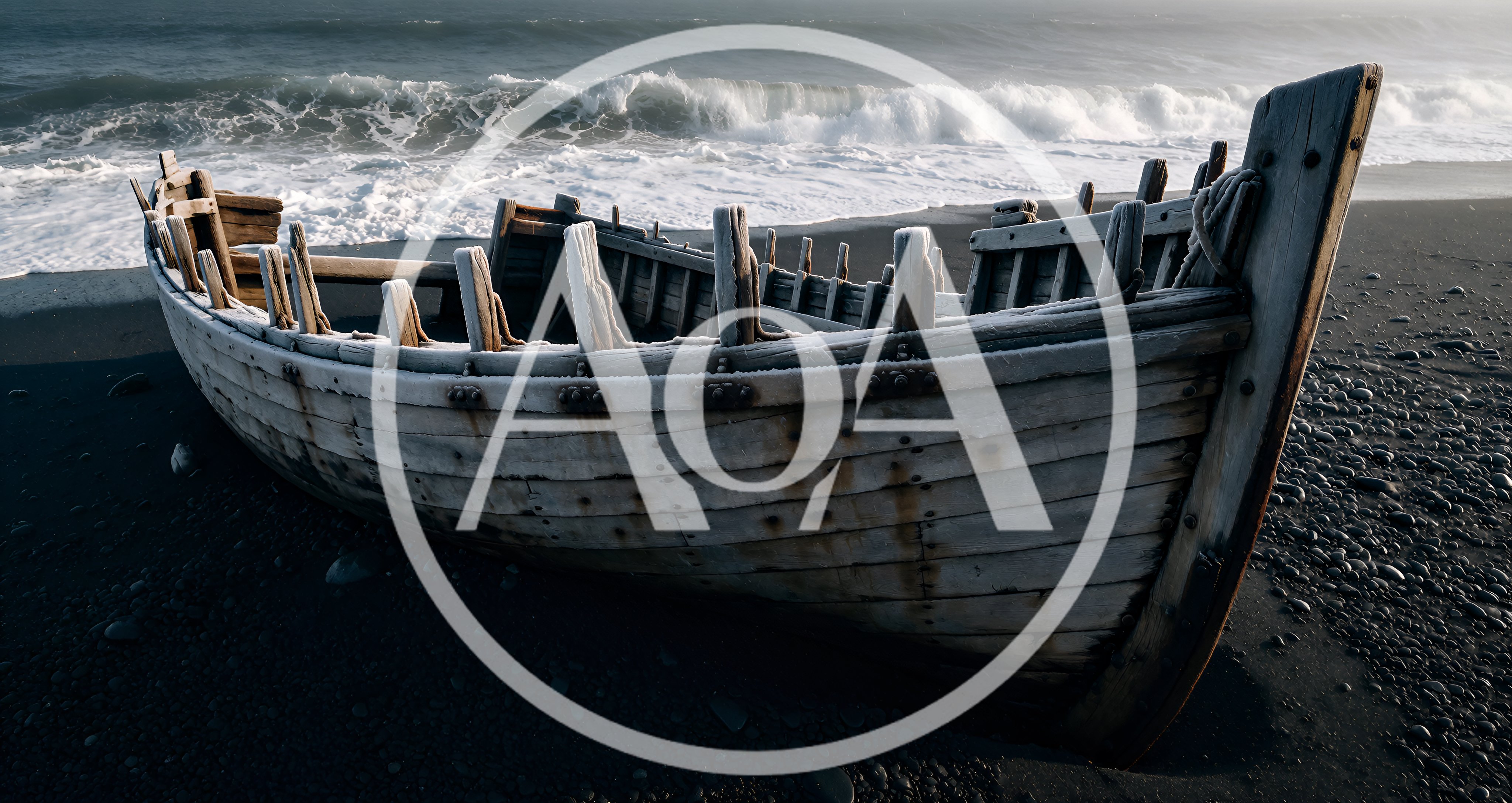 Old Wooden Boat Wreckage On Black Sand Beach