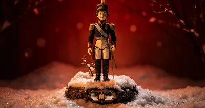 Nutcracker Soldier Figurine Standing In Snowy Landscape