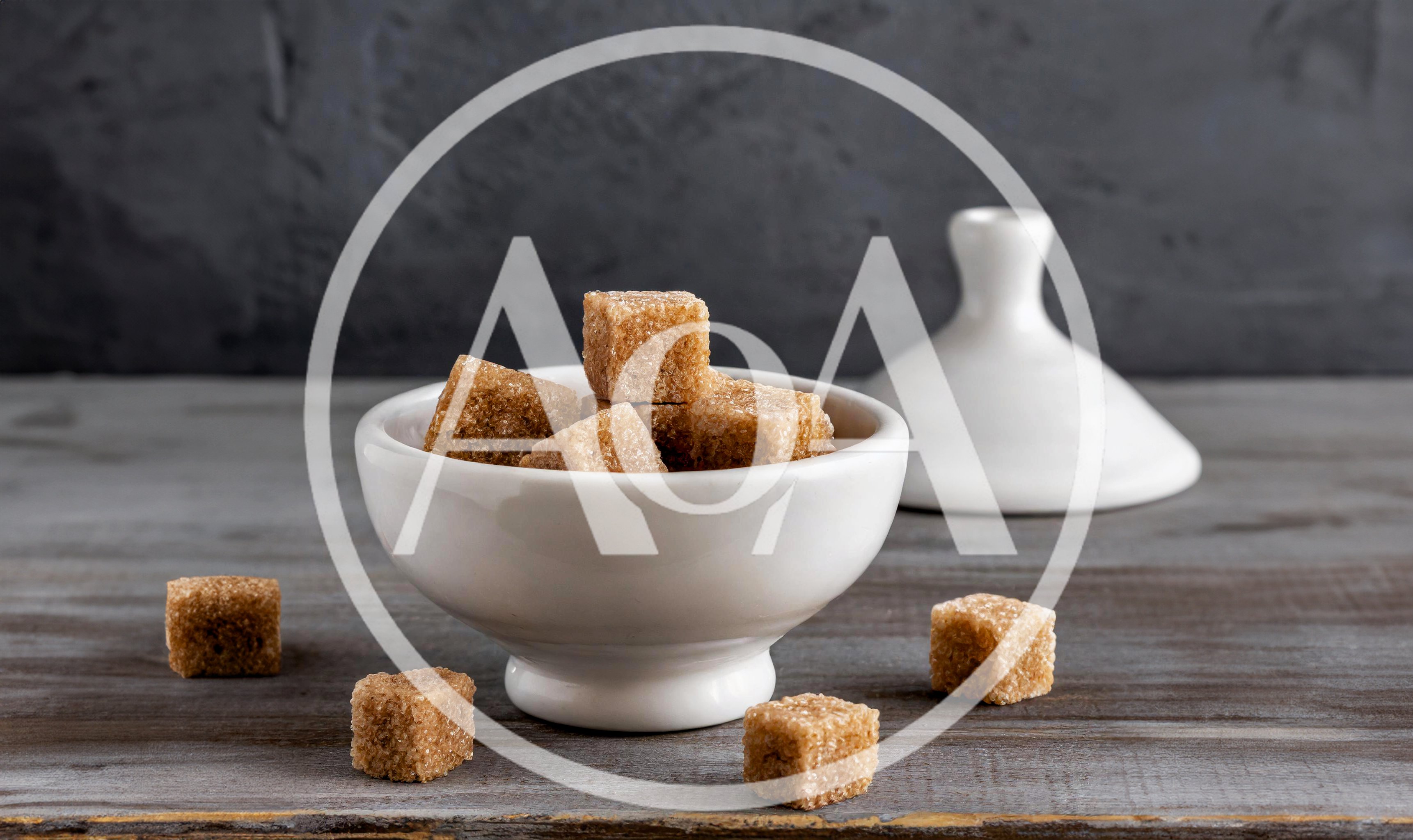 Brown Sugar Cubes in a White Ceramic Bowl