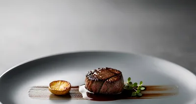 Gourmet Filet Mignon Steak Plated on Minimalist Dish