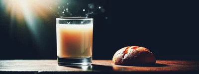 Glass Of Warm Milk And Fresh Bread Roll