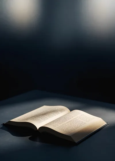 Open Book Illuminated by Soft Spotlight