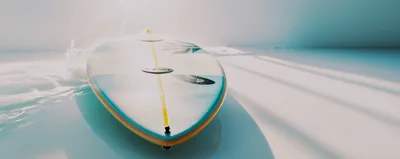 Surfboard Gliding Over Calm Blue Ocean Water