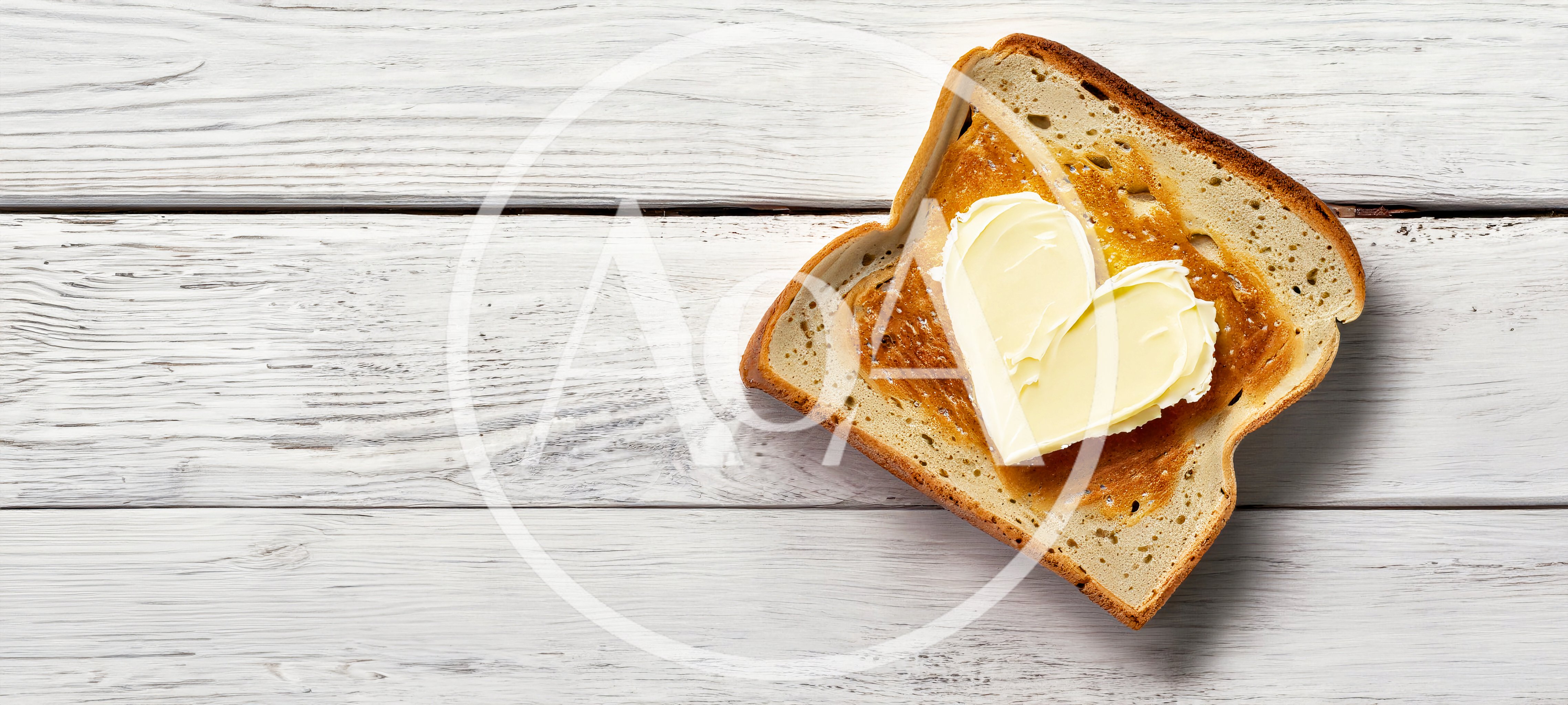 Heart Shaped Butter On Toasted Bread Slice