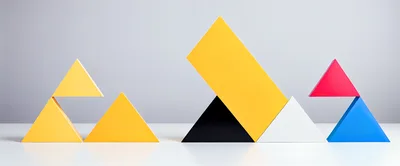Abstract Geometric Shapes Arranged On A White Surface