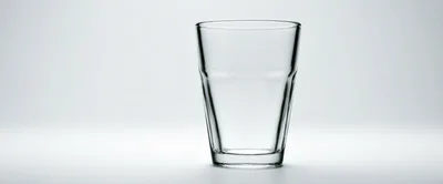 Empty Clear Glass Tumbler On White Background