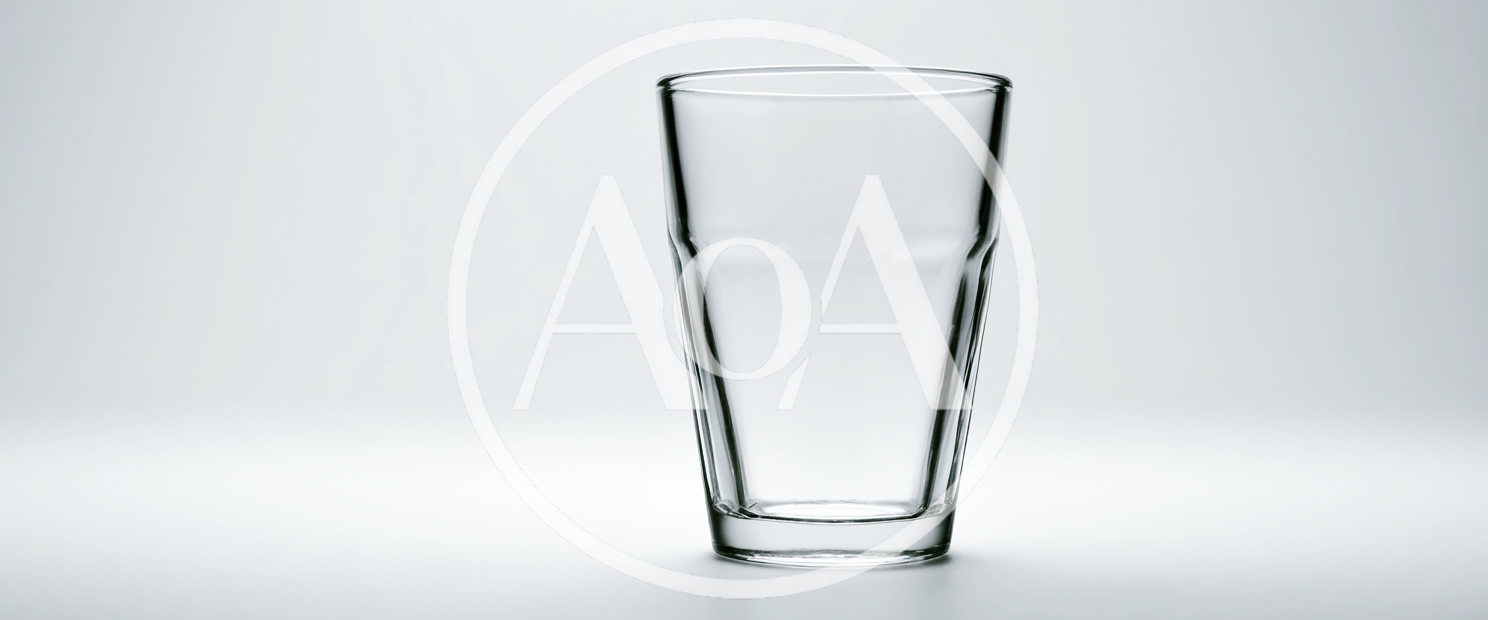 Empty Clear Glass Tumbler On White Background