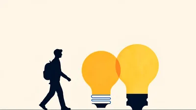Student Walking Past Glowing Light Bulbs