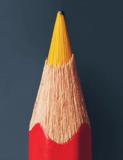 Macro Shot Of A Sharpened Red Pencil Tip