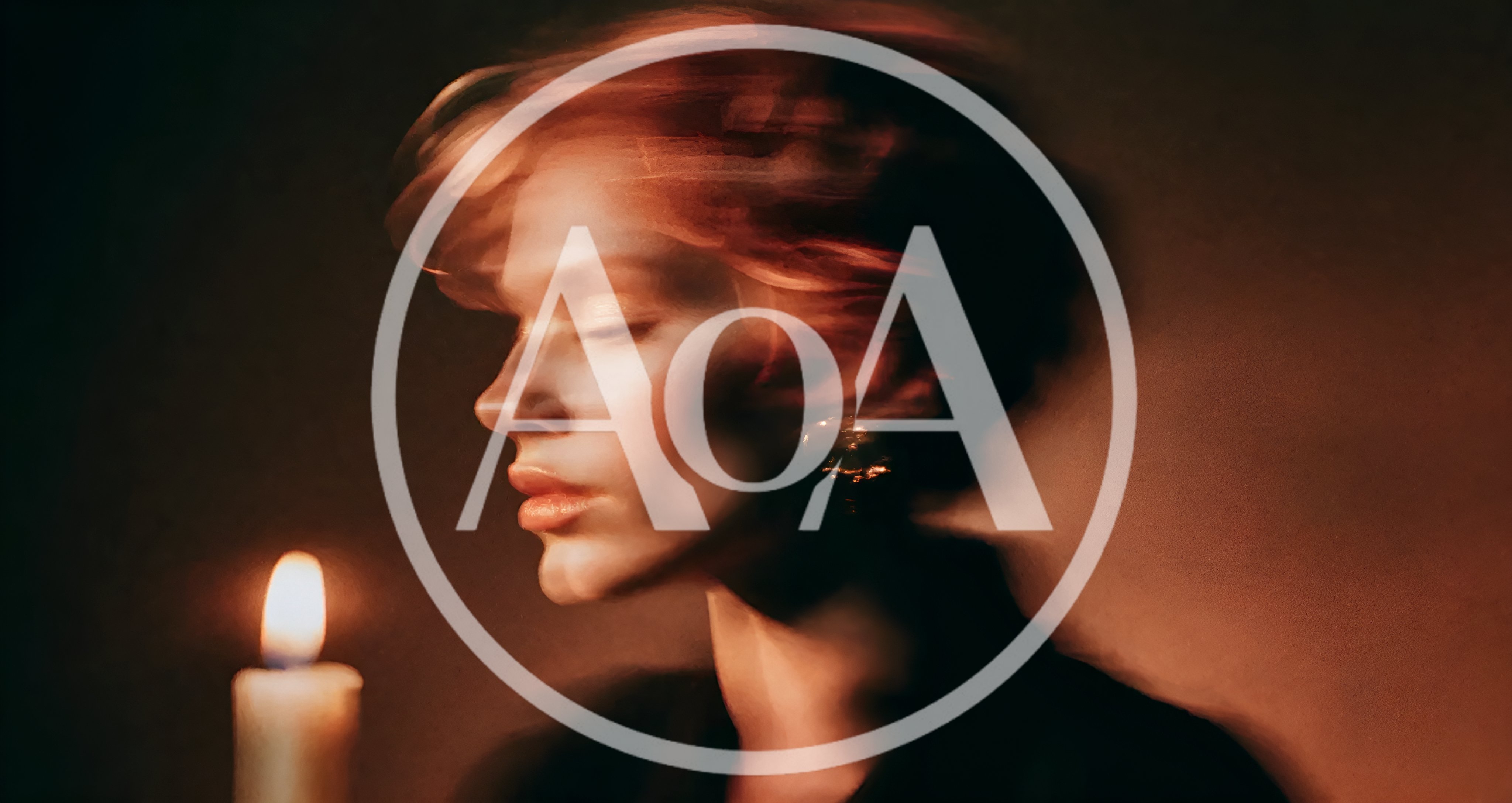 Woman With Motion Blur Effect Beside A Lit Candle