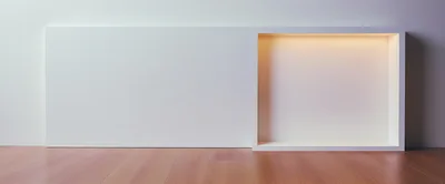 Minimalist White Wall With Recessed Illuminated Display Niche