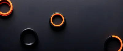 Abstract 3D Rings With Glowing Orange Accents